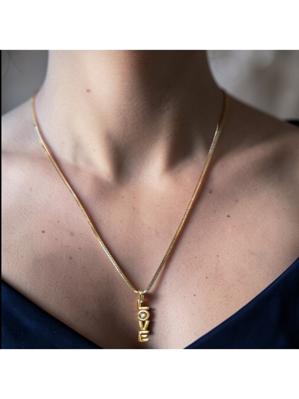Gold-Tone LOVE Pendant Necklace With Rhinestone Accent 18-Inch Snake Chain Timel